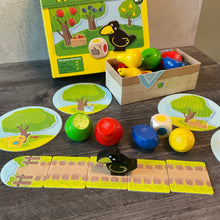 Load image into Gallery viewer, Shot of the path with the crow on it. The fruit is tipped to show the braille on it
