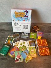Load image into Gallery viewer, Shot showing the components of Sleeping Queens. The two different decks, the helpers, the knights and the 3d printed die can be seen.
