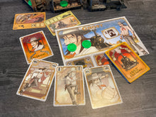 Load image into Gallery viewer, A shot of Ghost's player cards and player mat.
