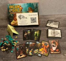Load image into Gallery viewer, The box with all the different kinds of cards set out. The replacement tokens for the 5 and 10 currency can also be seen in the picture.
