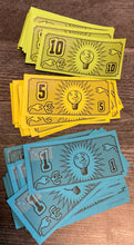 Load image into Gallery viewer, Game cash with transparent braille on it to indicate denomination
