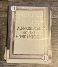 Load image into Gallery viewer, One of the start randomizer cards with braille on it.
