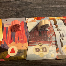 Load image into Gallery viewer, close up on the player pieces and the trail
