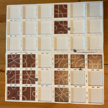 Load image into Gallery viewer, The thermoformed Tsuro replacement board setup . 3d printed pieces are in the slots along the board following the paths
