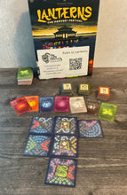 Load image into Gallery viewer, A shot of the game, the tiles, the cards and the favor tokens. All of them have transparent braille on them
