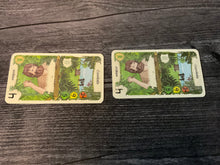 Load image into Gallery viewer, Some of the challenge cards. Transparent braille is on both of the cards.
