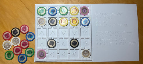 Thermoformed board replacement and gems with braille stickers on them
