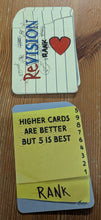 Load image into Gallery viewer, This is a close up of a rank card. Rank cards determine which cards are more likely to win the trick and rank the numbers. Sometimes it could be high to low, low to high, evens are high...
